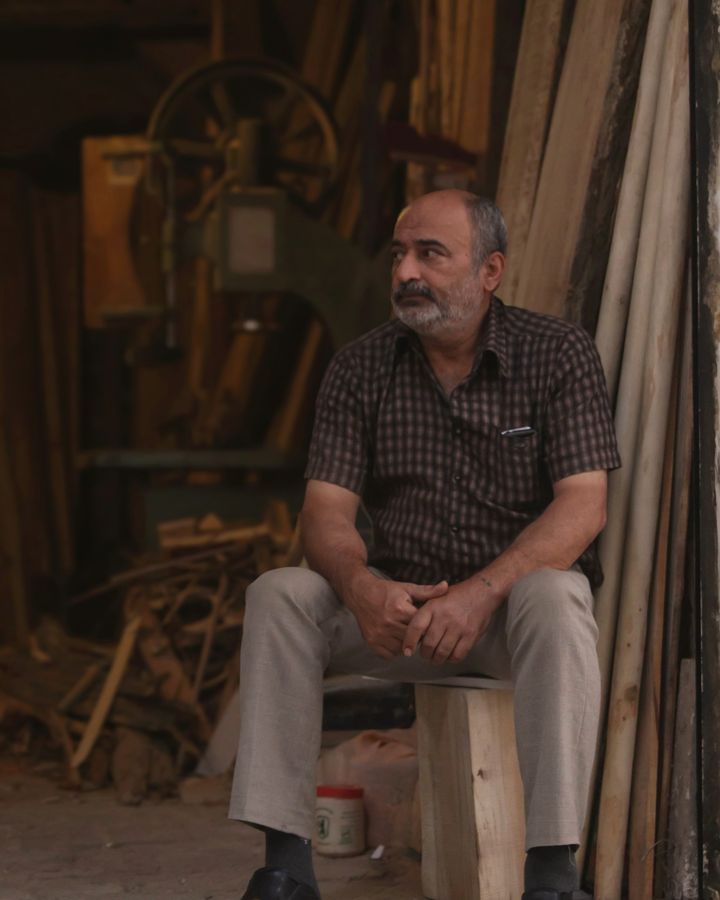 Illustrative image: a workshop interior with its owner